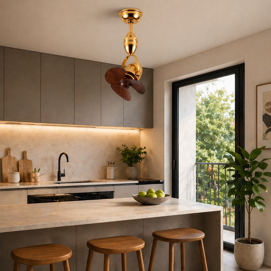 Modern kitchen with a Aurelia Luxe Ceiling Fan, wooden stools, and a bowl of fruit.
