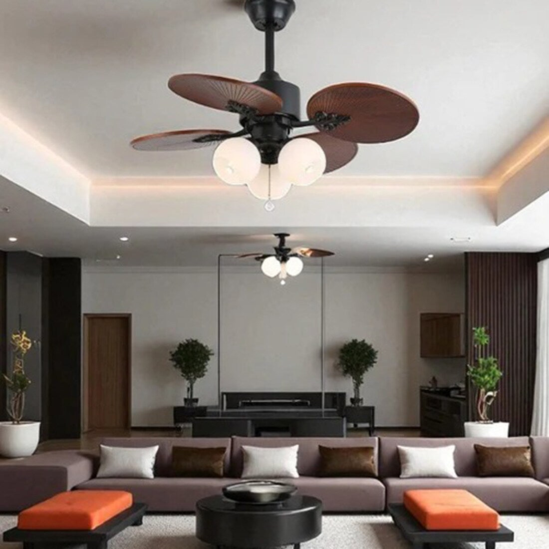 Modern living room with Aruba Tropics Ceiling Fan and a large sectional sofa.