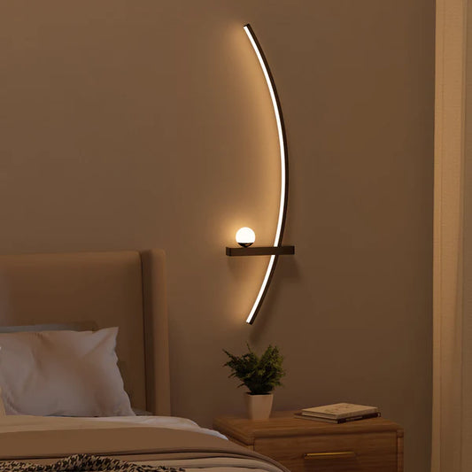 The Lunar Arc Wall Light highlighting a refined profile for upscale dining rooms